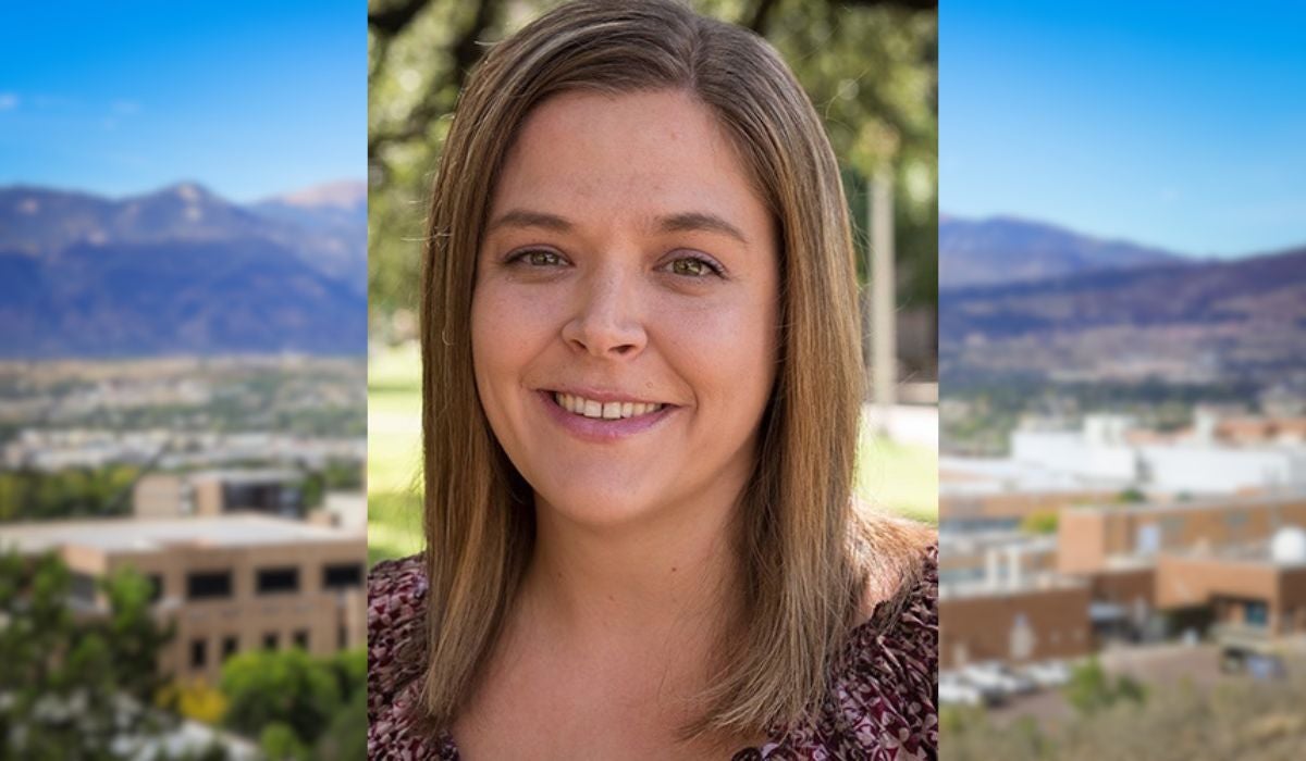 headshot of Shannon Johnson over a blurry image of UCCS campus