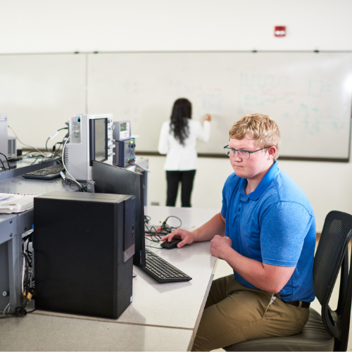 Engineering student working on a computer