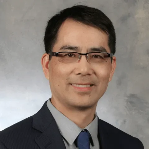 Headshot photo depicting interim dean Xiaobo Charles Zhou