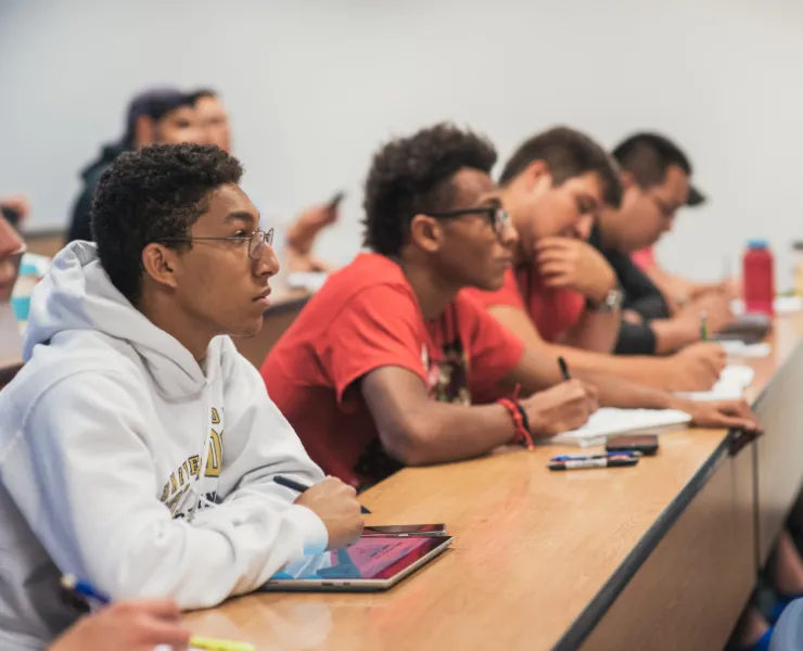 Students learning in a classroom