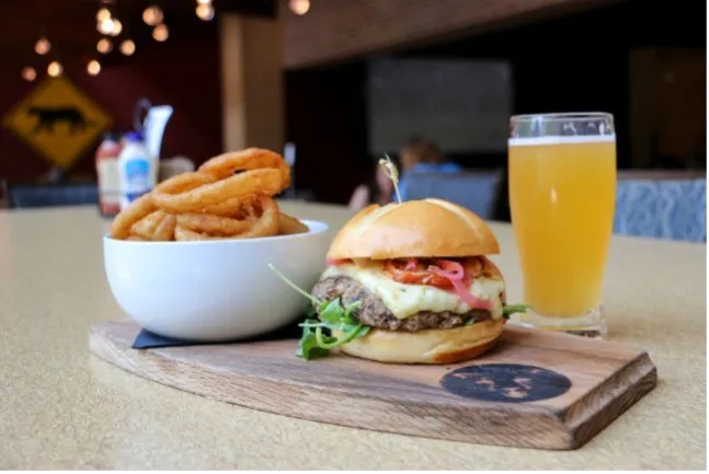 Hamburger and Fries with a Beer on a Serving Platter